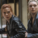 Natasha Romanoff (Scarlett Johansson, left) and Yelena Belova (Florence Pugh, right), share a motorcycle in Marvel's Black Widow